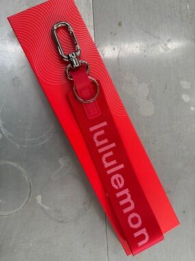 New in box Lululemon Red Never Lost Keychain